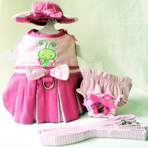 Platinum Puppy Couture - Butterfly Baby 4-pc Harness Dress Set - This little dress set is adorable!!  The pink and white gingham dress top is embellished with an embroidered Baby Butterfly design.  The pleated skirt is made in a soft bright pink fabric with contrasting white and pink gingham pleats.  This dress has an added D-ring for easy leash access.  It comes with matching flip-front hat and leash.  It also comes with a darling pair of matching panties.  These are great to use if your pet is in season or just as part of the outfit.  It also looks darling on those dogs with a slightly longer body (if dresses are usually too short).