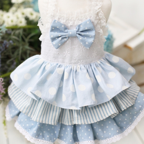 Juny Bell - Bianca - This dress is simply beautiful.  Embroidered eyelet bodice is accented with bow, and has elastic lace shoulder straps.  Various sky colored fabrics create the 3-tiered ruffle skirt.